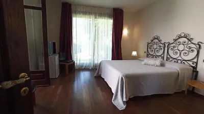 Letto o letti in una camera di B&B Villa Nella