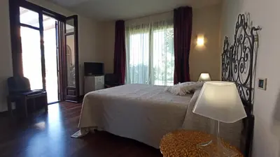 Letto o letti in una camera di B&B Villa Nella