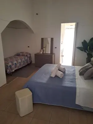 Letto o letti in una camera di Casa sofi'