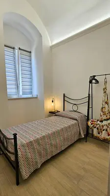 Letto o letti in una camera di L'amurusa