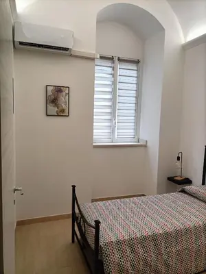 Letto o letti in una camera di L'amurusa