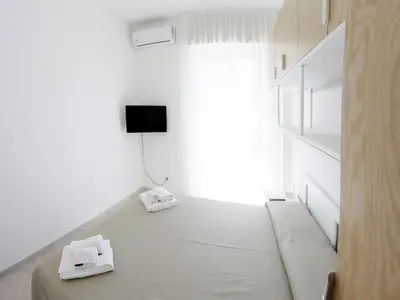Letto o letti in una camera di Sikelia holiday house