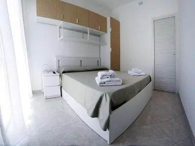Letto o letti in una camera di Sikelia holiday house