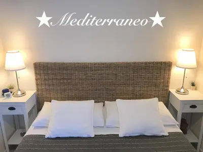 Letto o letti in una camera di La Terra dei Mari Room & Relax