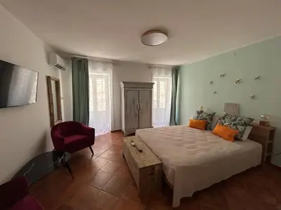 Letto o letti in una camera di Casa Le Moire