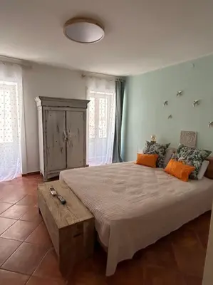Letto o letti in una camera di Casa Le Moire