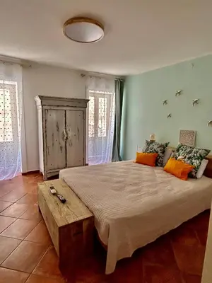Letto o letti in una camera di Casa Le Moire