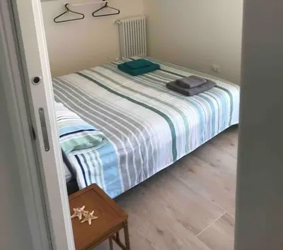 Letto o letti in una camera di Bougainville House