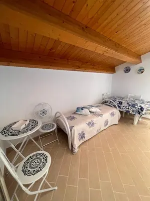 Letto o letti in una camera di Villa Carratois