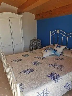 Letto o letti in una camera di Villa Carratois