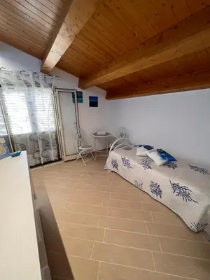 Letto o letti in una camera di Villa Carratois