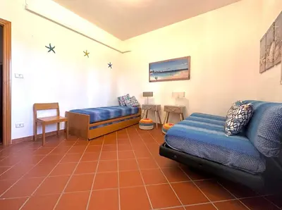 Area soggiorno di Rock Garden Villa by Ortigia Apartments