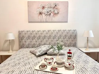 Letto o letti in una camera di Rock Garden Villa by Ortigia Apartments