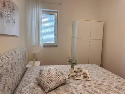 Letto o letti in una camera di Rock Garden Villa by Ortigia Apartments