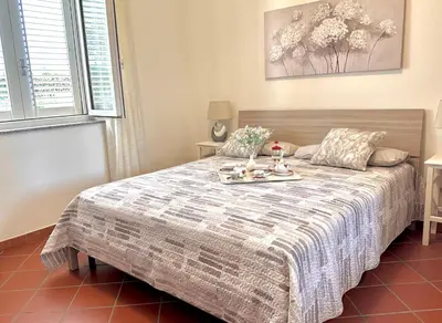 Letto o letti in una camera di Rock Garden Villa by Ortigia Apartments