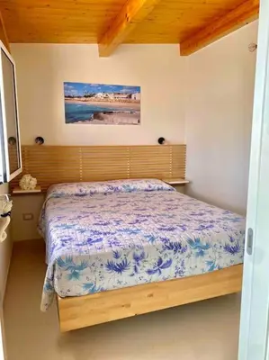 Letto o letti in una camera di Avola Fronte Mare Villa Giulia