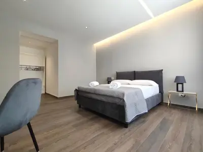 Letto o letti in una camera di Nine Sweet Rooms