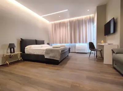Letto o letti in una camera di Nine Sweet Rooms
