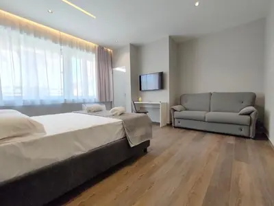 Letto o letti in una camera di Nine Sweet Rooms