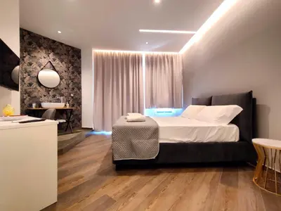 Letto o letti in una camera di Nine Sweet Rooms