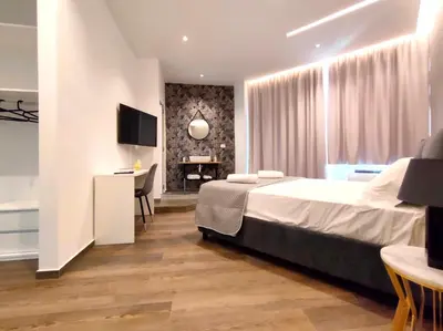 Letto o letti in una camera di Nine Sweet Rooms