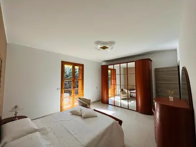 Letto o letti in una camera di Casa Manila