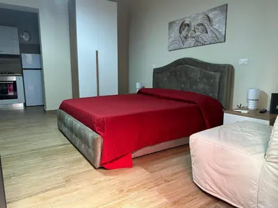 Letto o letti in una camera di BonaHouse