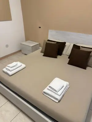 Letto o letti in una camera di BonaHouse
