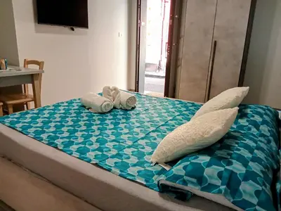 Letto o letti in una camera di BonaHouse