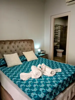 Letto o letti in una camera di BonaHouse