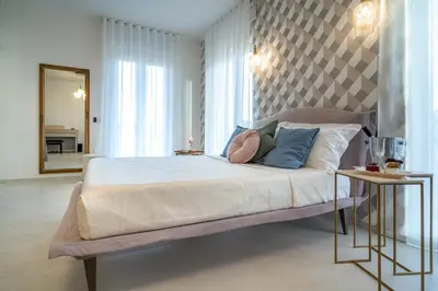 Letto o letti in una camera di Maiolica Rooms