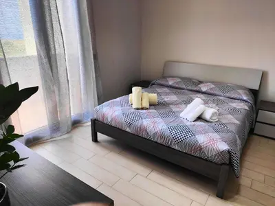 Letto o letti in una camera di Siracusa Suite, AC + Wi-Fi + Free Private Parking