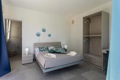 Letto o letti in una camera di ISULATRAVEL- Dimora di Eos