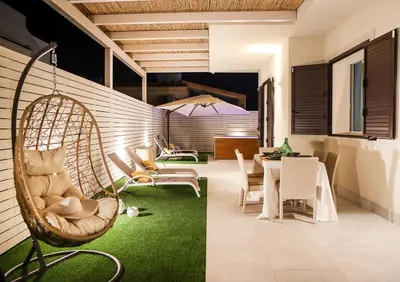Area soggiorno di Villa Teresann con Jacuzzi riscaldata