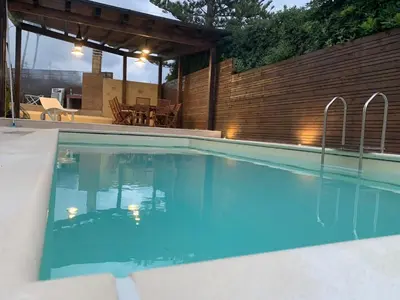 Piscina di Apartment in villa with swimming pool 20 meters from the sea o nelle vicinanze