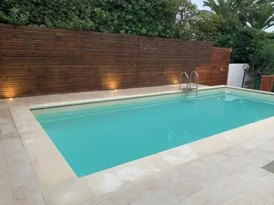 Piscina di Apartment in villa with swimming pool 20 meters from the sea o nelle vicinanze