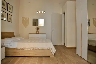 Letto o letti in una camera di Il Melograno