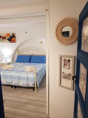 Letto o letti in una camera di Rosso Moro