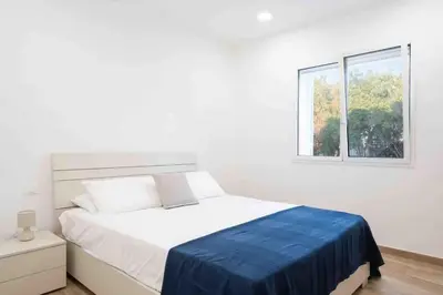 Letto o letti in una camera di Villa Eraklea