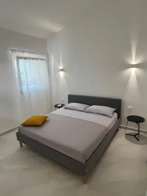 Letto o letti in una camera di Villa Giuliana Luxury Home: piscina, solarium, barbecue. A pochi passi dal mare
