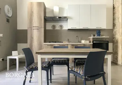 Cucina o angolo cottura di Borgata Home - Casa Vacanza Siracusa