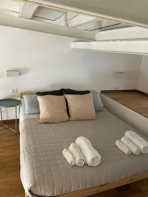 Letto o letti in una camera di Casa Core