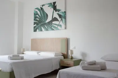 Letto o letti in una camera di Panta Rei Charme Suite - 5 min from the sea