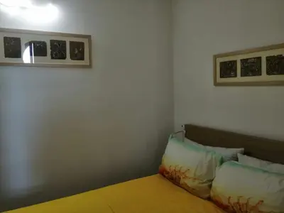 Letto o letti in una camera di Piccola Santa Maria Sul Mare