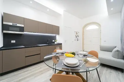 Cucina o angolo cottura di GuestHost - Elegant & Central Ortigia Apartment