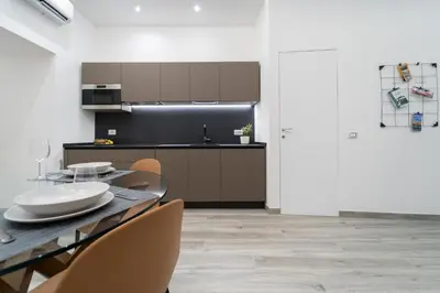 Cucina o angolo cottura di GuestHost - Elegant & Central Ortigia Apartment
