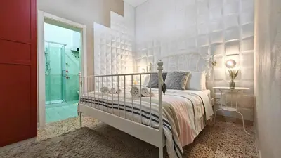 Letto o letti in una camera di Delizia House Ortigia,Centro città, vicino al Mare