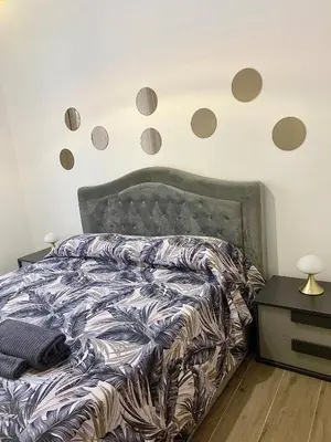 Letto o letti in una camera di Global center Catania