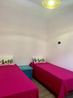 Letto o letti in una camera di Global center Catania