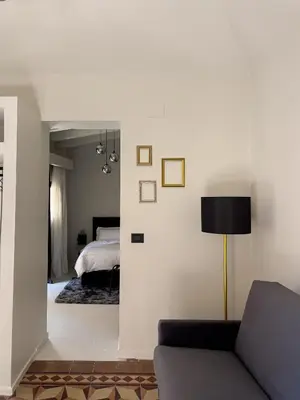 Letto o letti in una camera di VICOLO SAN GAETANO -luxury rooms-